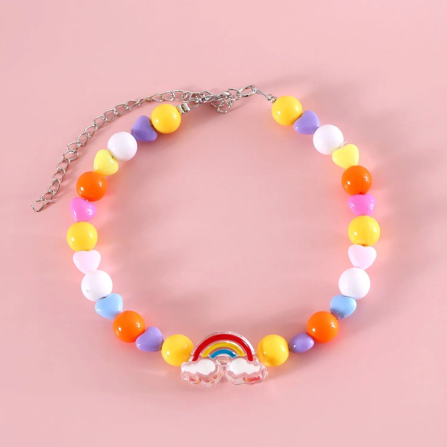 Colourful plastic bead pet necklace in small flower, rainbow, or peach design on an adjustable collar