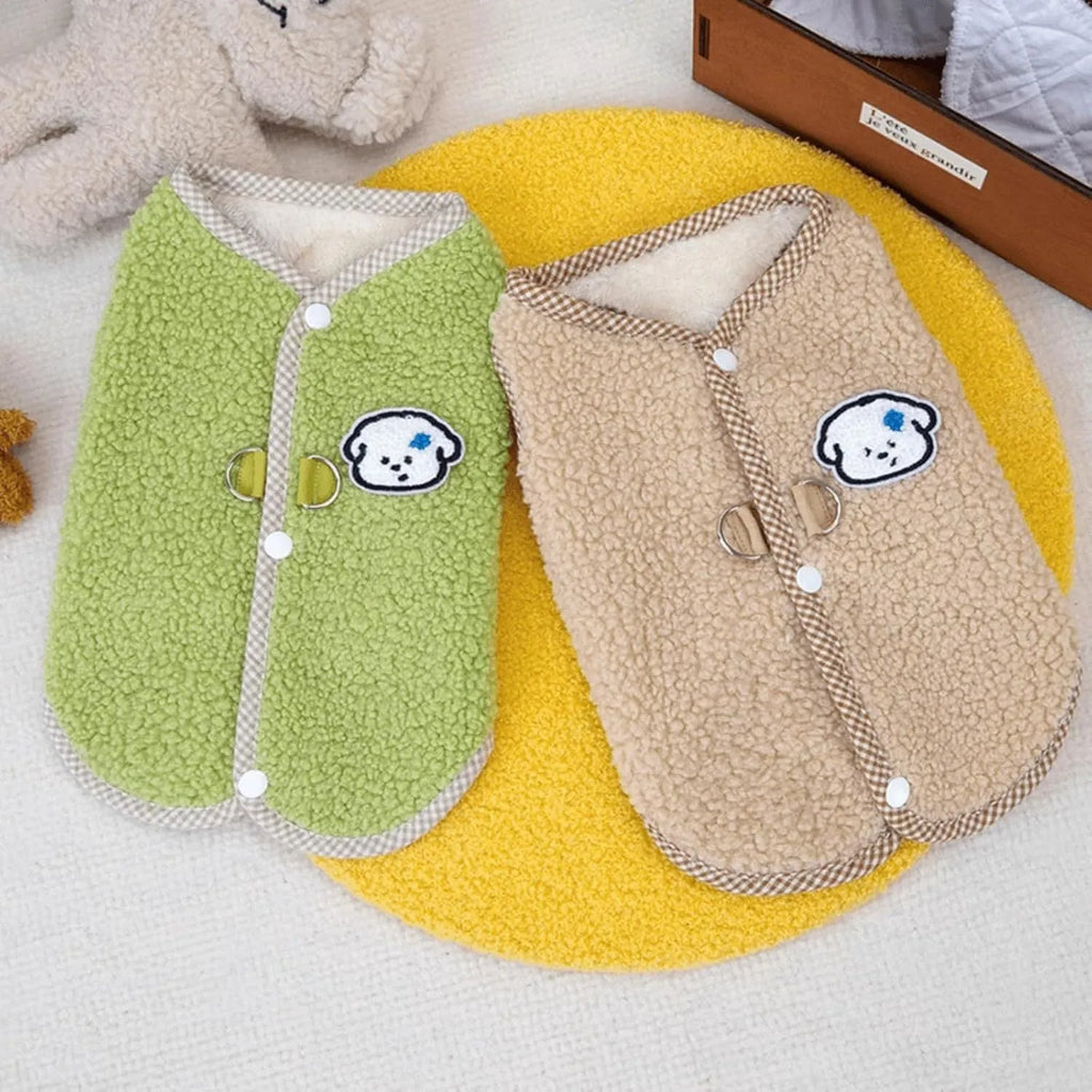 Green coral fleece dog sweatshirt vest with a leash ring on a small dog.
