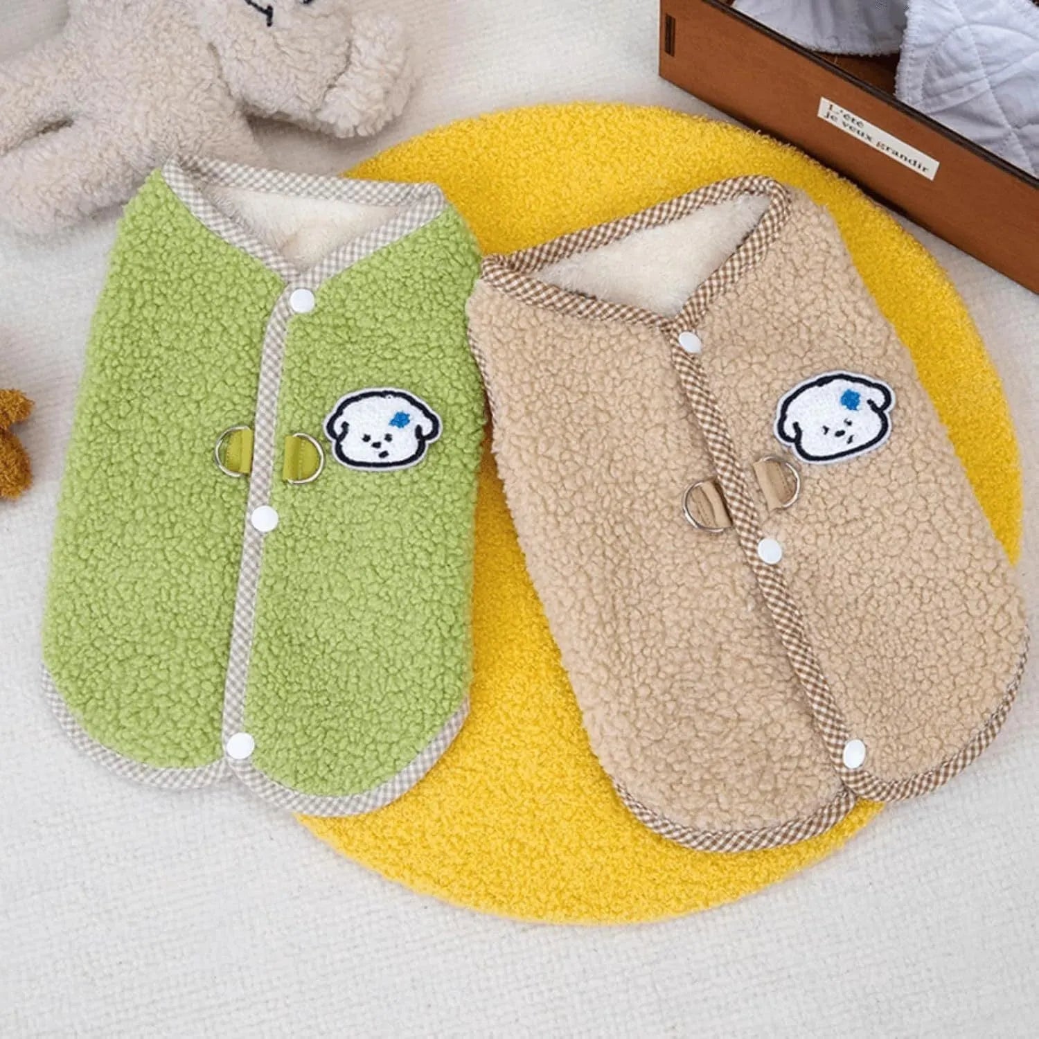 Green coral fleece dog sweatshirt vest with a leash ring on a small dog.