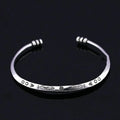 Women's silver-toned bracelet with Chinese retro fish design and magnetic clasp.