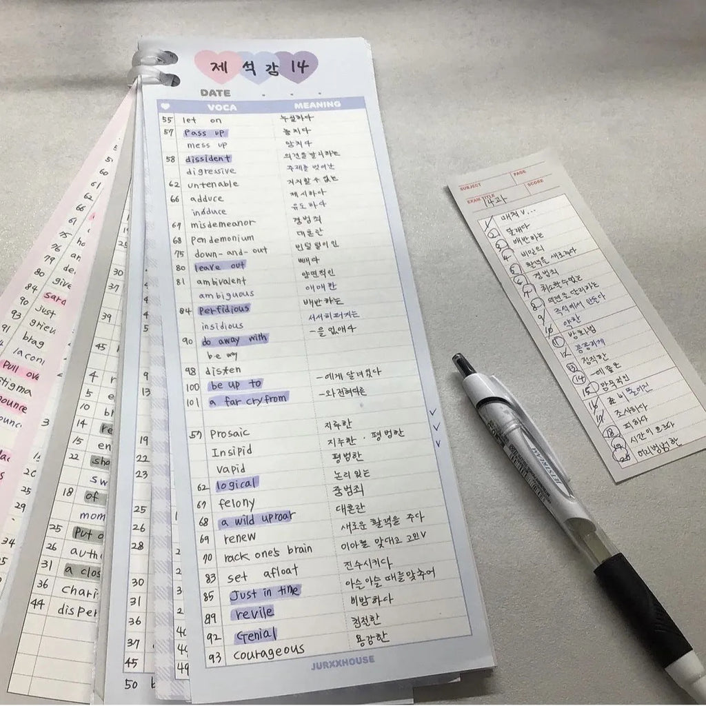 Vertical English word notepad in blue, pink, or purple cover, showing double-sided printed pages.