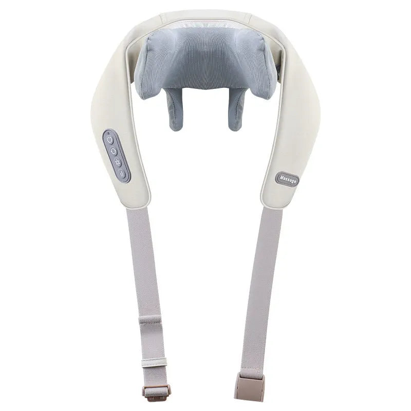 Beige neck massage pillow with six massage heads and wireless remote control on a table