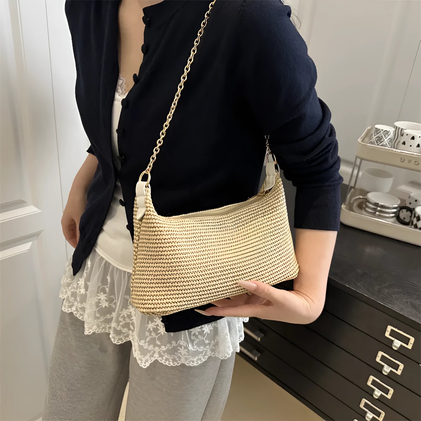 Woven straw crossbody handbag in horizontal square shape with phone compartment