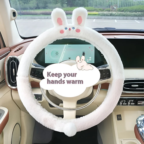Plush steering wheel cover with embroidered bear design, shown fitted on a car steering wheel.