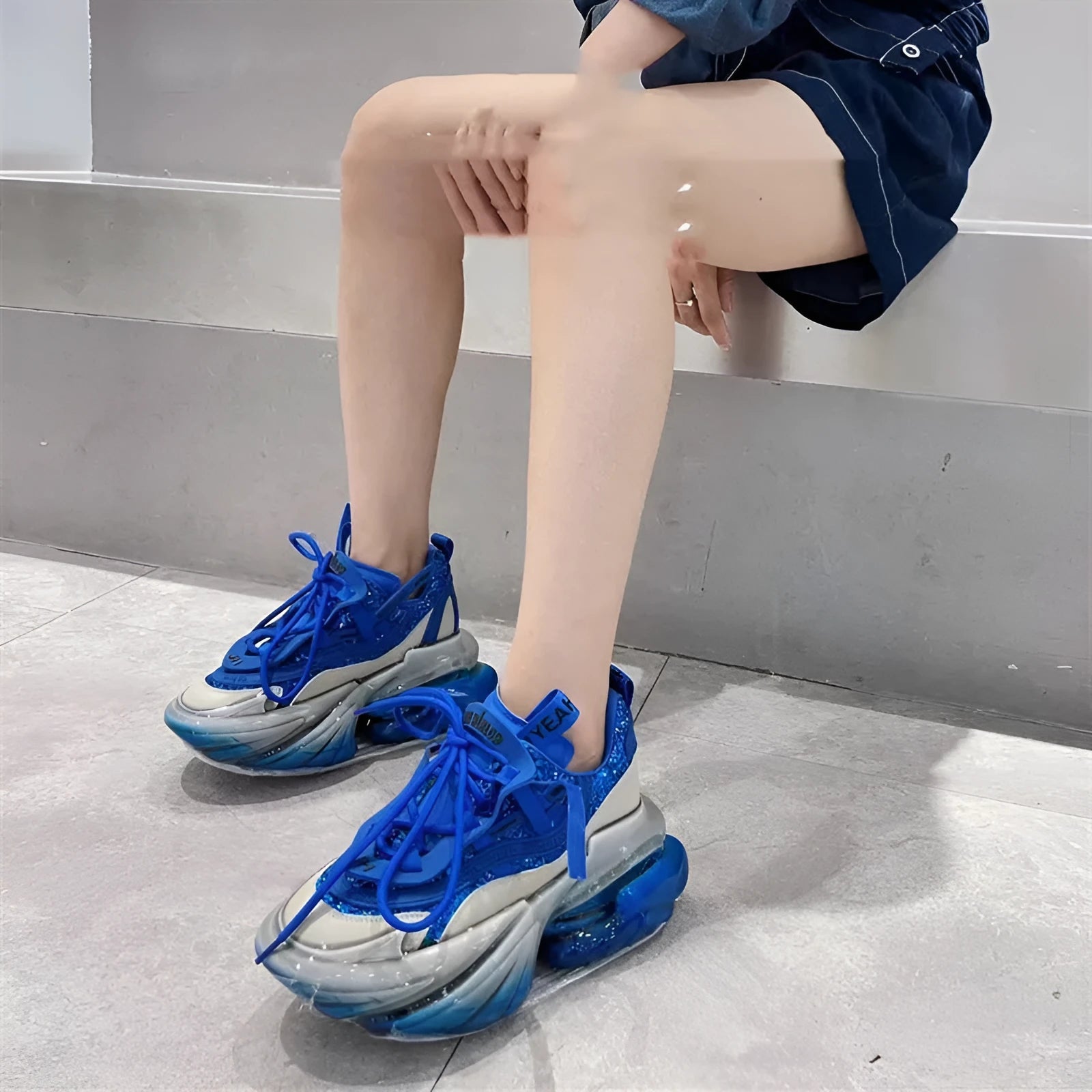 Women's leather casual sports shoes with thick rubber soles and cross-tie closure in multiple colours