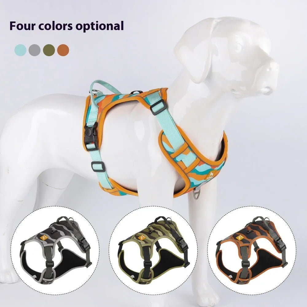Reflective orange dog harness and lead set with chest and back straps held in a hand.