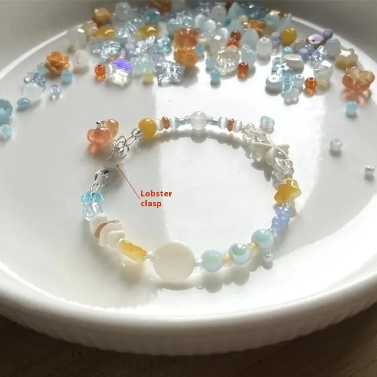 Orange sea summer dopamine bracelet for women with diamond shapes and round elements in mixed materials