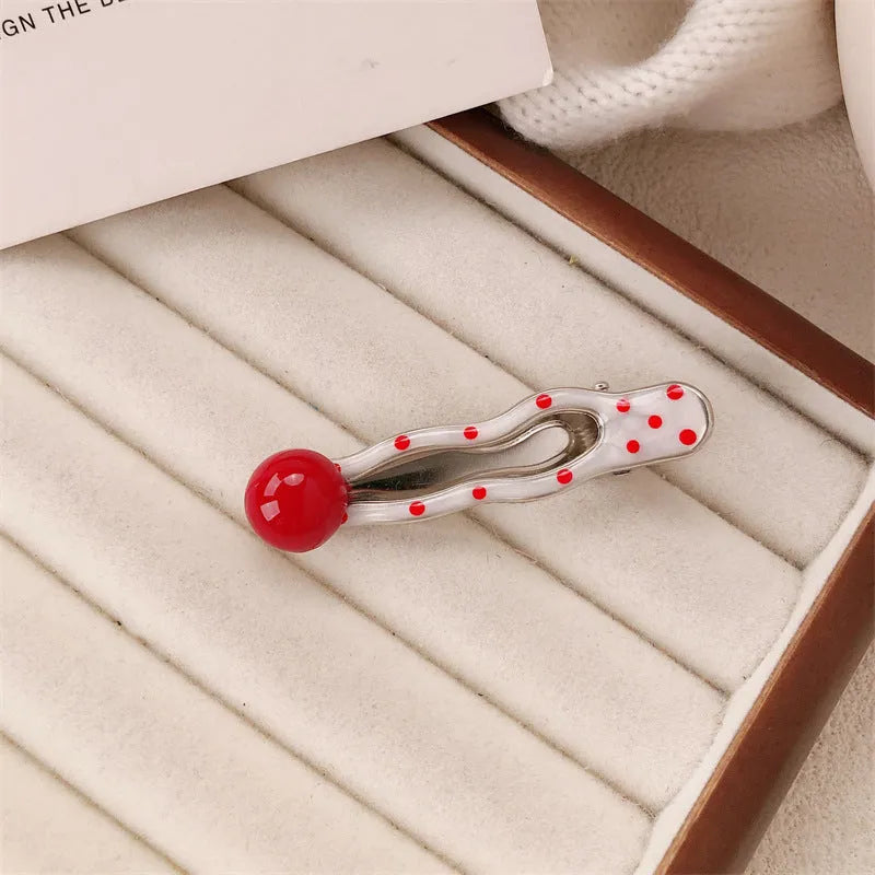Red stereo love heart-shaped hairpin with French retro dots and willow leaf design