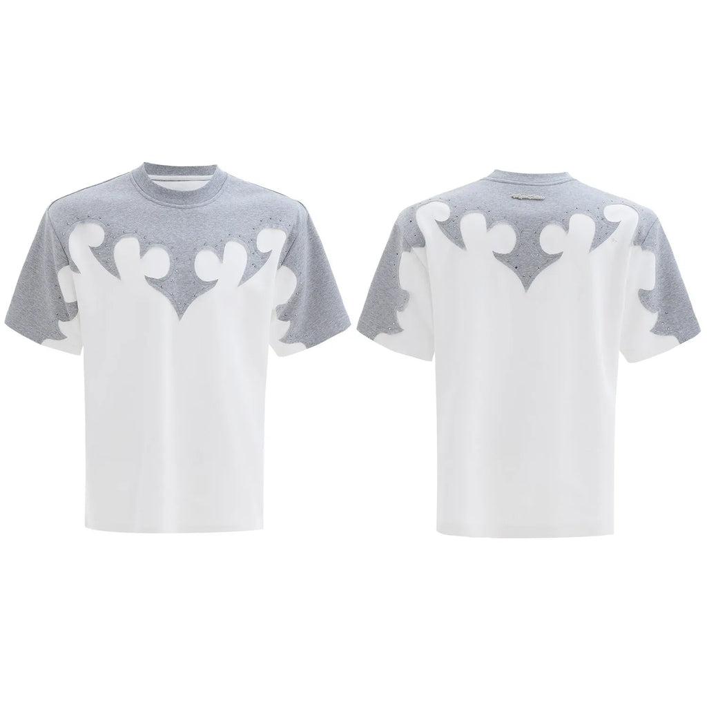 Grey men's T-shirt with raised black floral embroidery and rhinestone details on a dropped shoulder, loose-fit design.