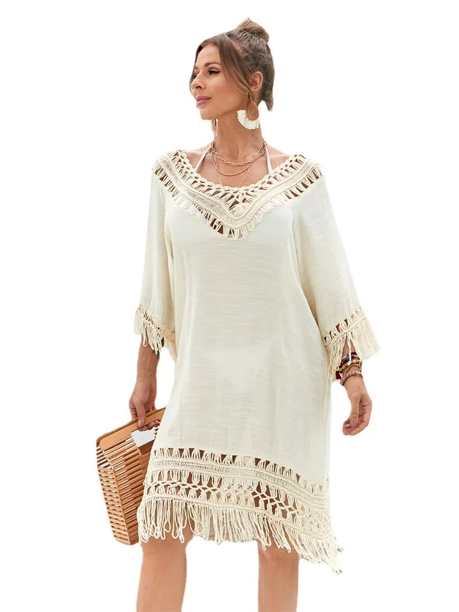 Apricot coloured hand-crocheted women's beach dress with a lining.
