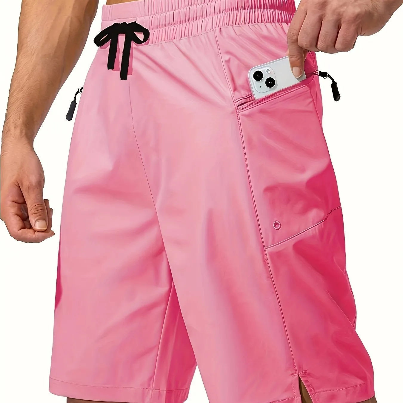 Men's quick-drying beach shorts in solid colours showing straight-leg design and polyester fabric texture