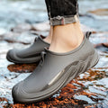 Men's short solid colour rain boots in plastic construction available in multiple colours