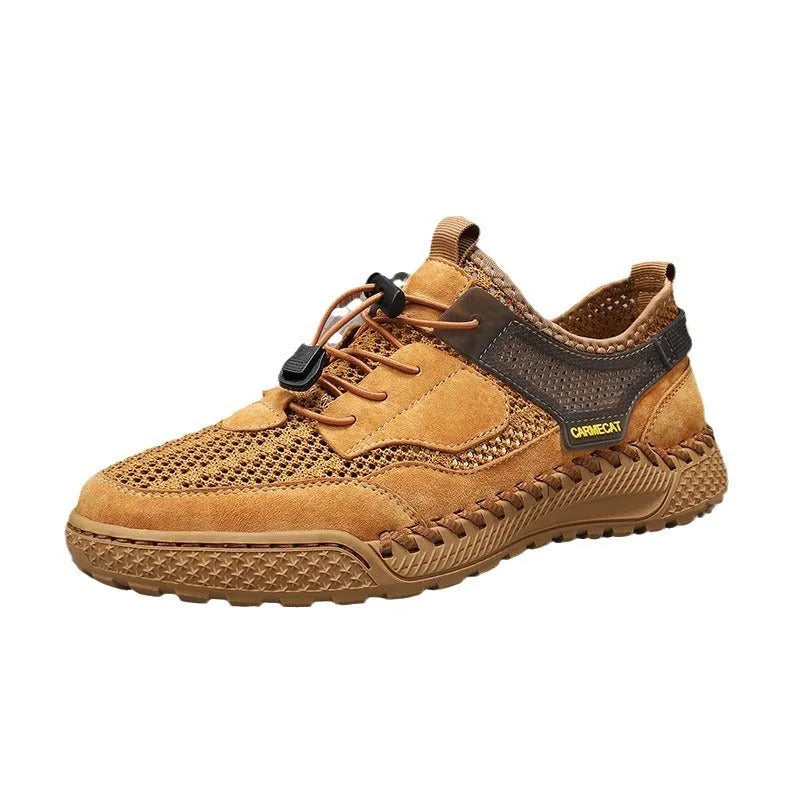 Men's brown suede tennis shoes with elastic band closure and hand-stitched rubber soles