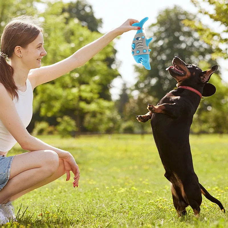 Blue textured dog chew toy shaped with ridges mimicking shark teeth for dental cleaning