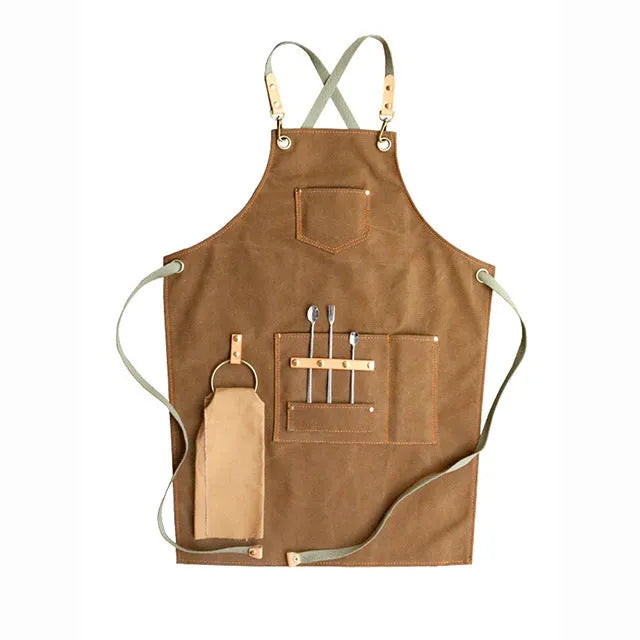 Canvas apron with cross-back straps in camel colour