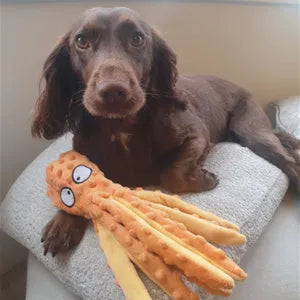 Blue unfilled octopus plush dog toy with crinkle and squeaker, shown next to a tape measure indicating its 32cm length.
