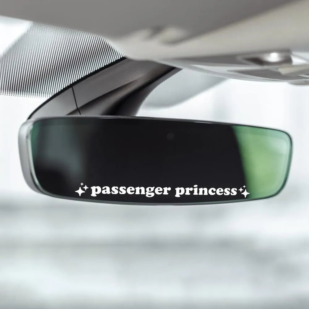 Plastic rearview mirror sticker 10x3cm in black on a car mirror