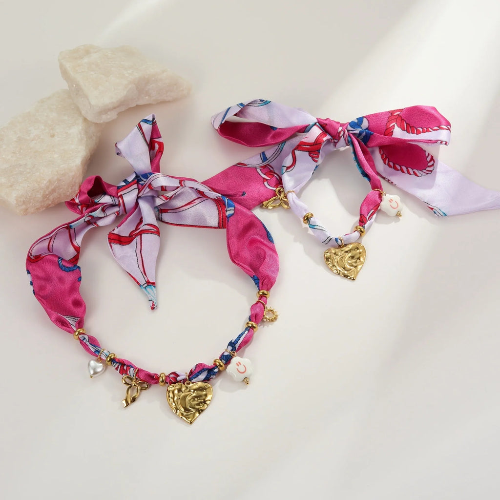 Stainless steel necklace and bracelet set with colourful silk scarf pendant and geometric chain design