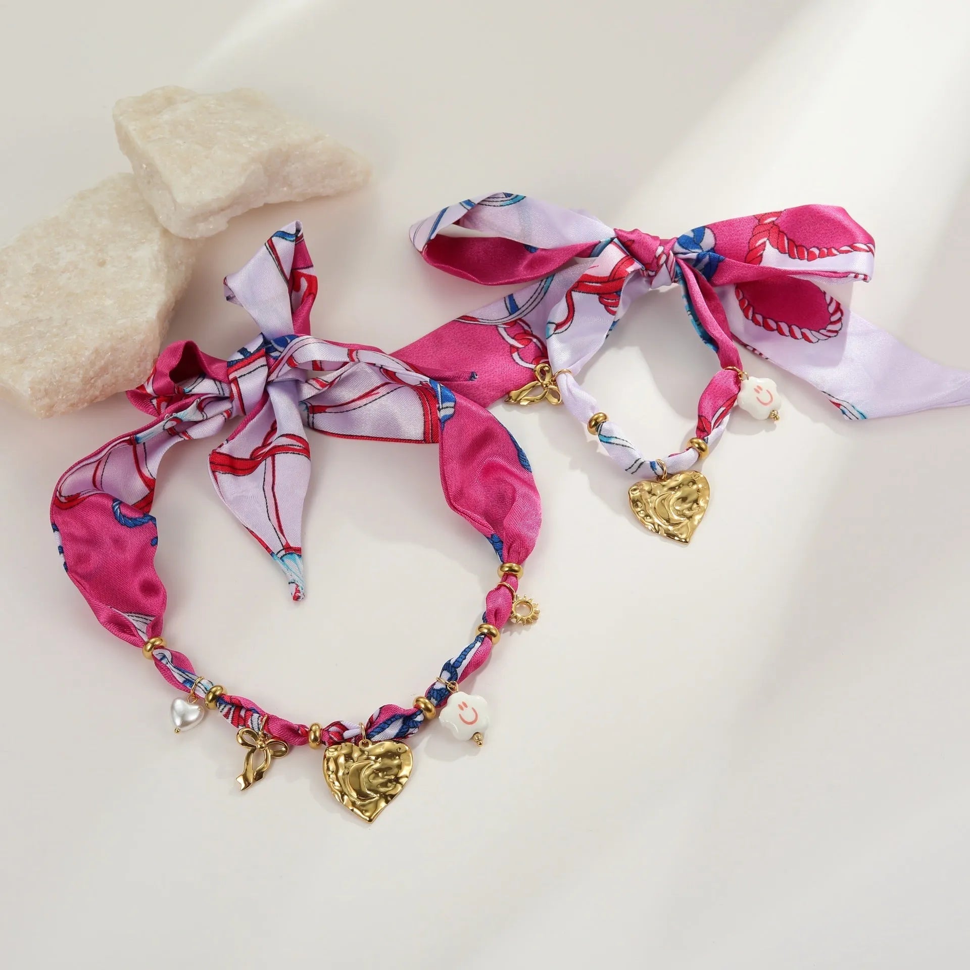 Stainless steel necklace and bracelet set with colourful silk scarf pendant and geometric chain design