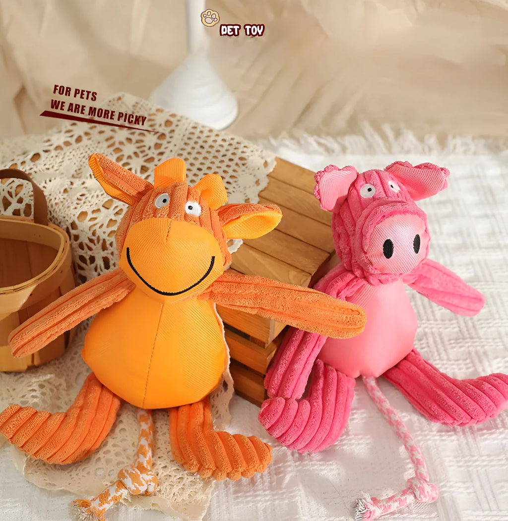 Plush dog toy in cow and pig design with squeaker, 40 x 32cm, orange or pink