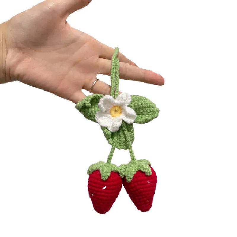 Handmade strawberry-shaped weaving pendant made of cotton and hemp wool for car decoration.