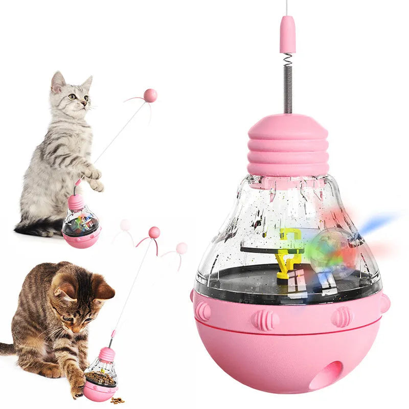 Electric yellow interactive cat toy with rocking base, teaser wand, and slow feeder dispenser
