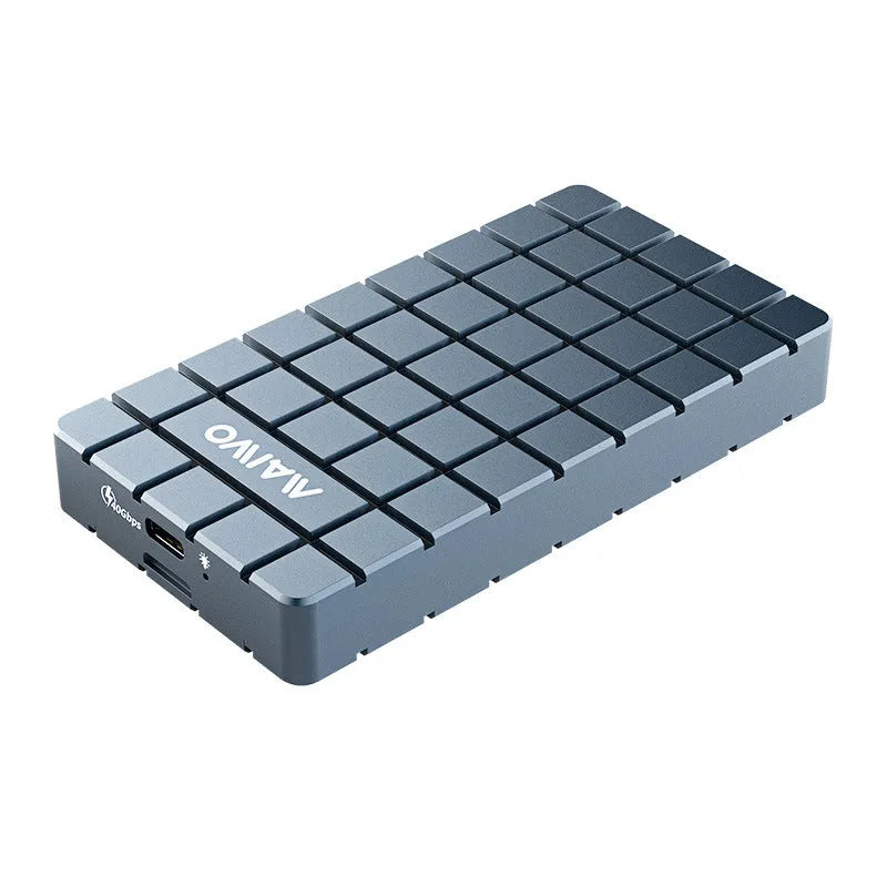 Aluminium USB4 hard disk enclosure for SSD, shown next to a MacBook.