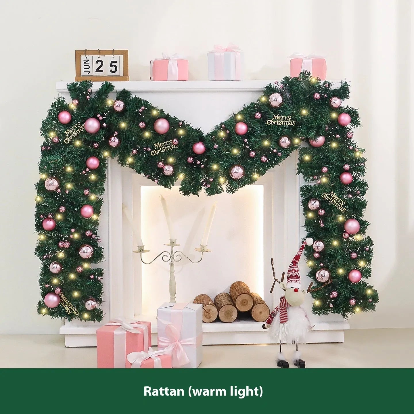 2.7 metre long pink Christmas rattan decoration with 240 decorative heads draped on a mantelpiece