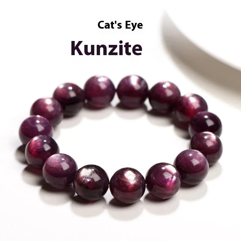 Purple lepidolite crystal round bead bracelet with polished finish and adjustable closure on a wrist.