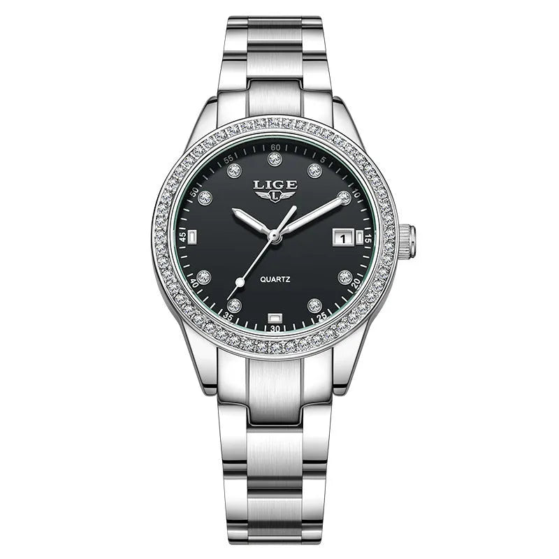 Silver fashion quartz watch with diamond markers on a 34mm stainless steel case and luminous hands.