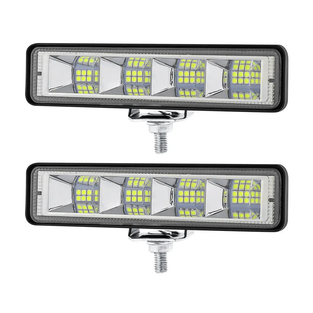 Four white aluminium LED work lights with IP67 rating, suitable for automotive and off-road use.
