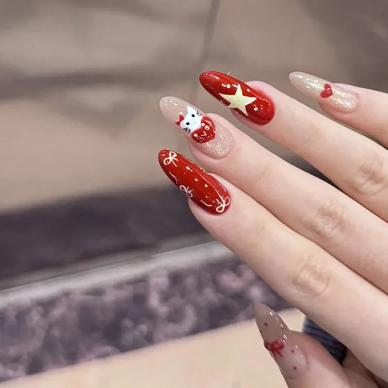 Set of medium-length coffin-shaped false nails with French manicure glitter tips and rhinestone decorations.