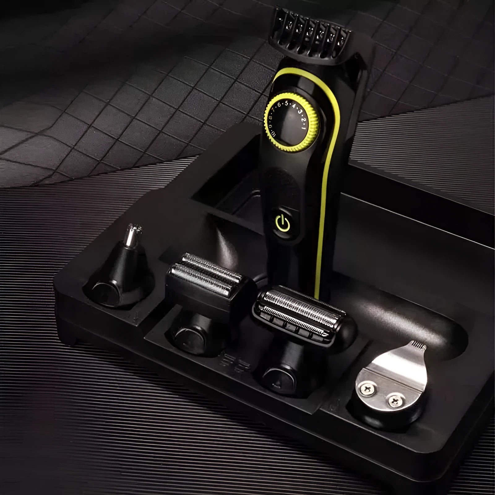 Black household electric hair clipper set with stainless steel blades and USB charging cable.