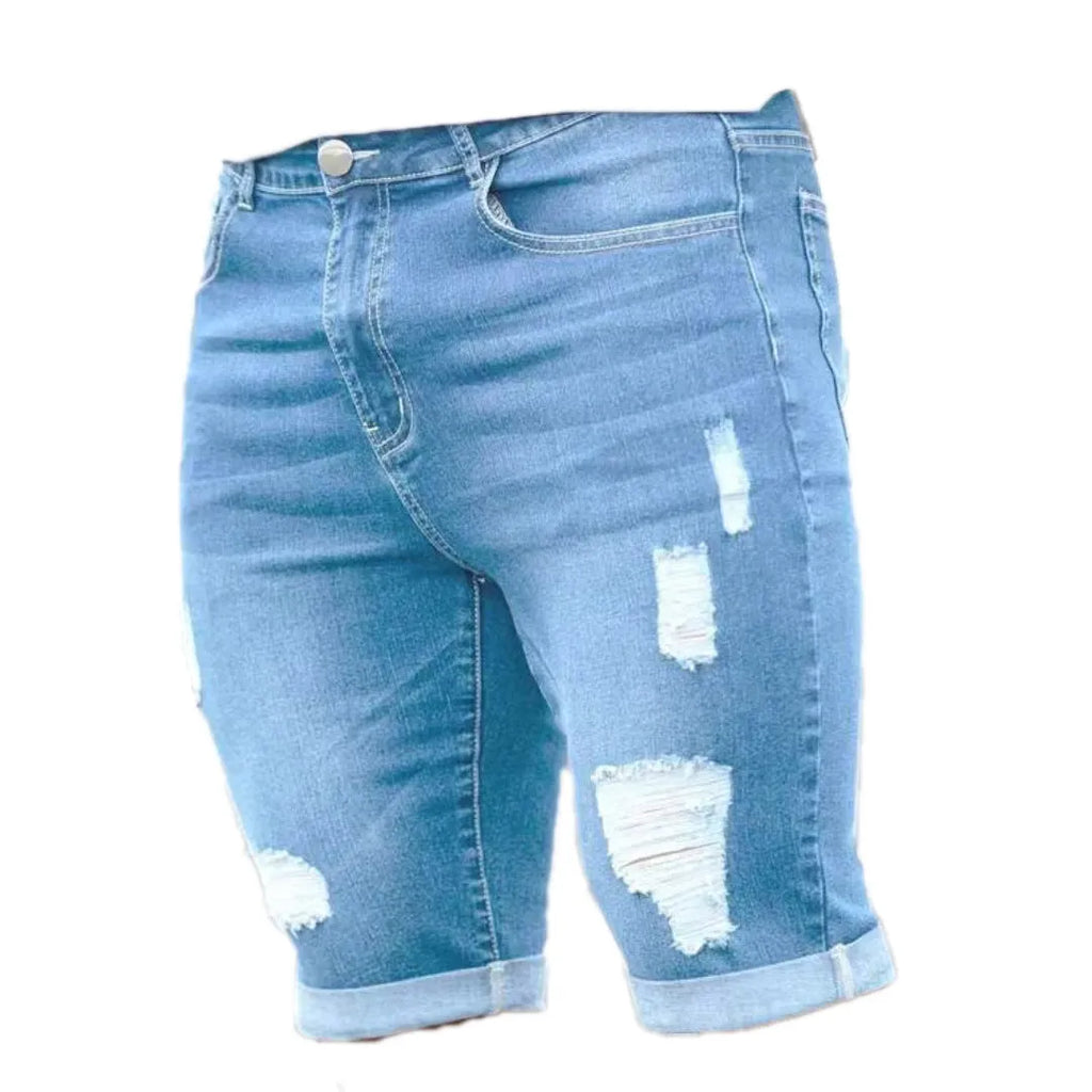 Men's sky blue straight-leg denim shorts with low waist and zipper fly.