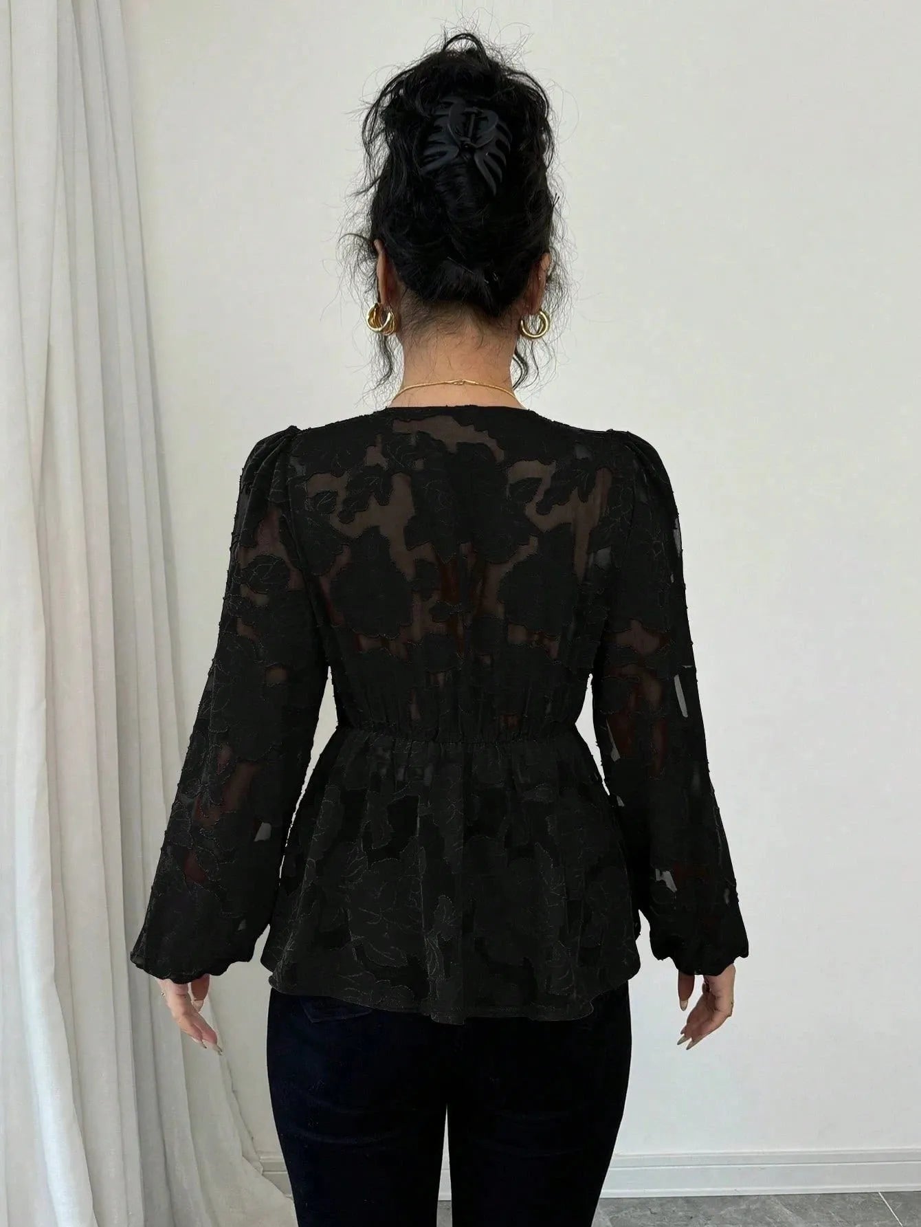 Semi-transparent hollow-out polyester long-sleeved V-neck women's shirt in black with embroidery details