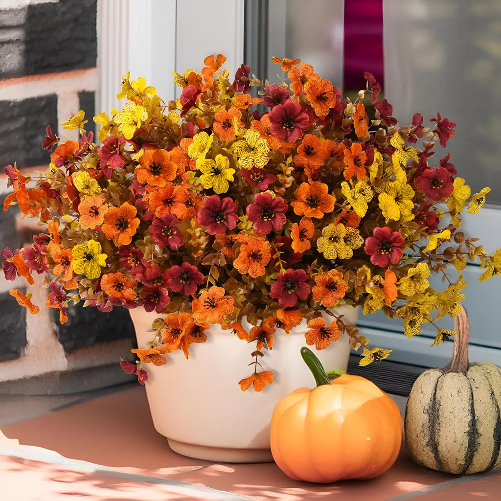 Plastic artificial flower bouquet with silk details in autumn orange, orange yellow, red or yellow for home and wedding decoration