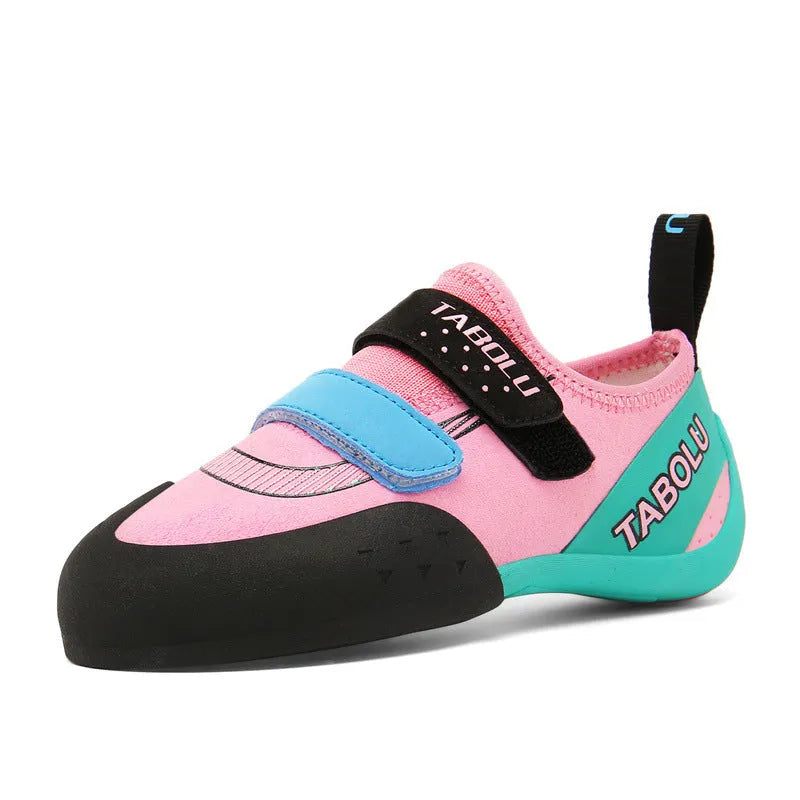 Men's and women's beginner rock climbing shoes with Velcro straps and coloured trim.