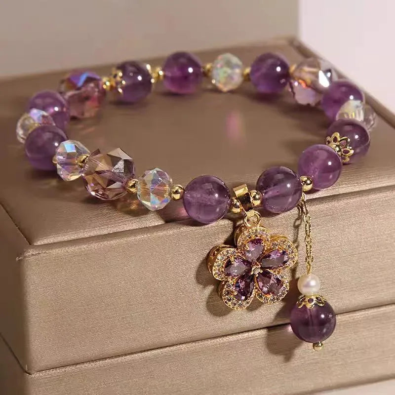 Women's antique-style crystal bracelet with a nine-tailed fox pendant and a separate amethyst floral charm.