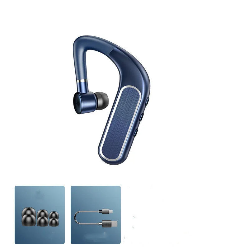 Black Bluetooth earphones with a charging warehouse case and silicone ear caps on a table.