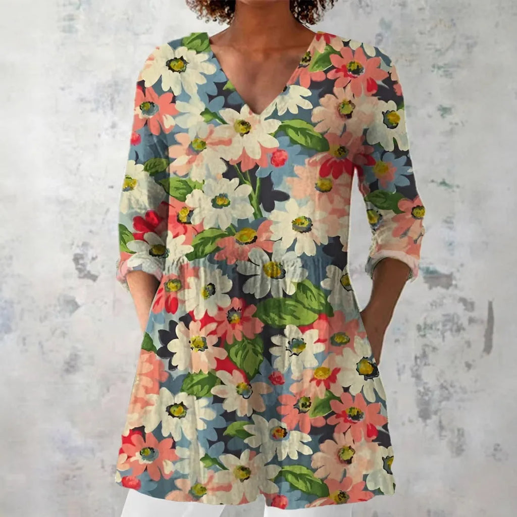 Women's retro-style slim fit long-sleeved top with a colourful digital print pattern.