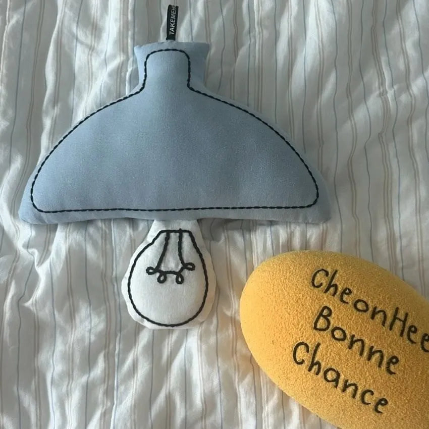 Beige fabric lampshade LED bedside lamp hanging on nursery wall for baby feeding