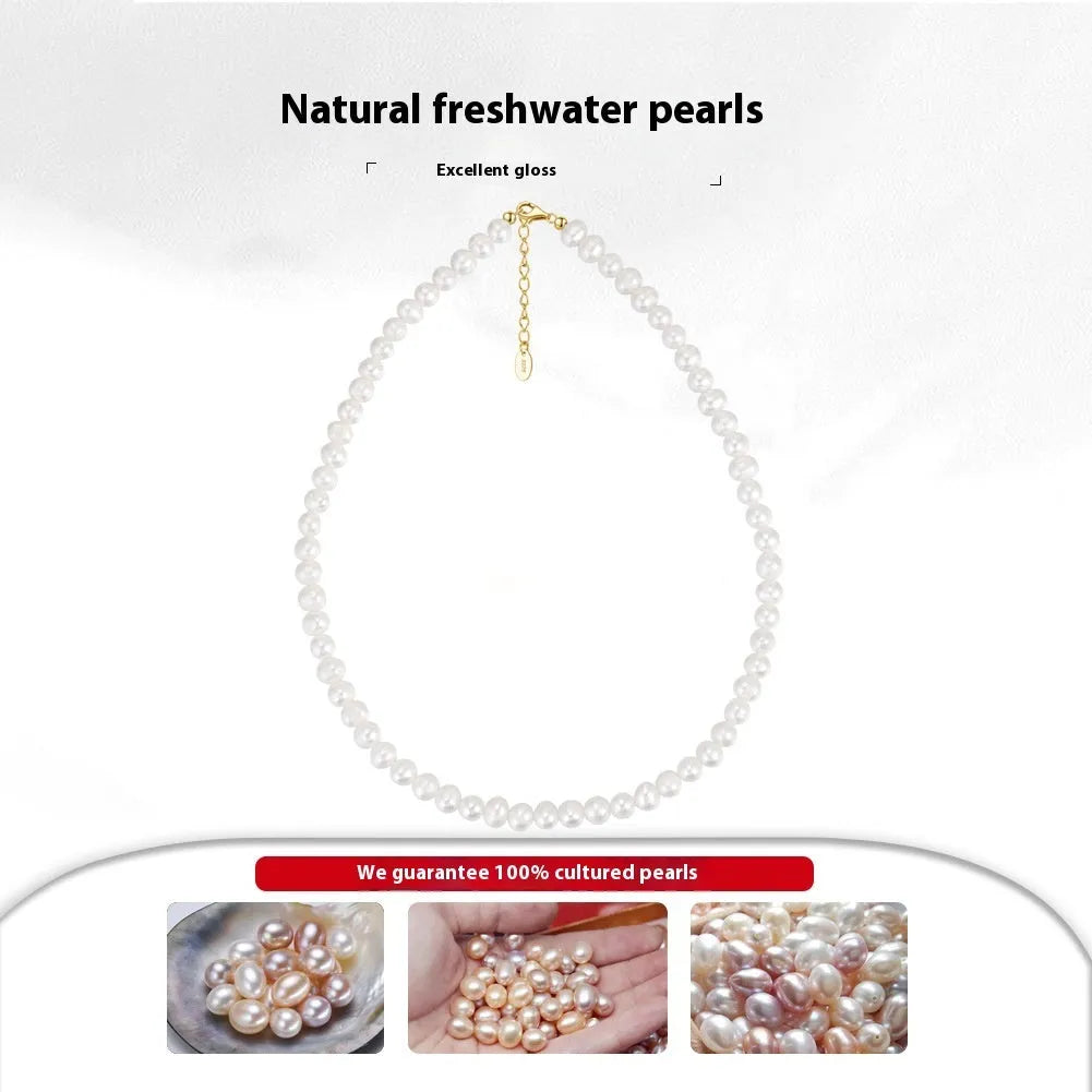 Women's silver necklace with a single round freshwater pearl and adjustable lobster clasp.
