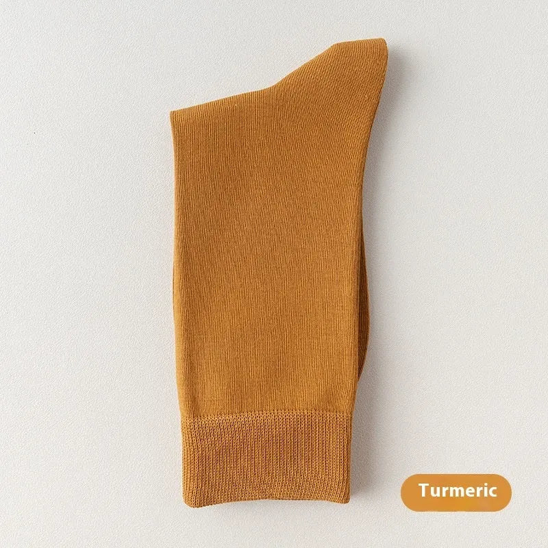 Mid-calf men's business socks in combed cotton available in twelve solid colours