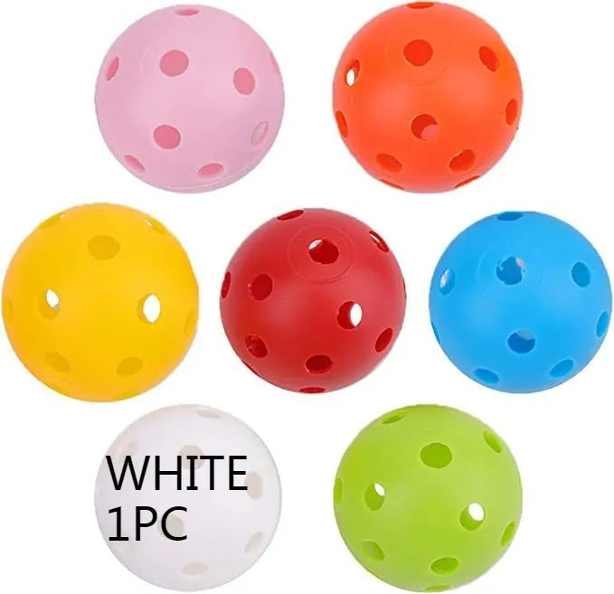 Multi-coloured 42mm golf practice balls with dimpled design in a net bag.