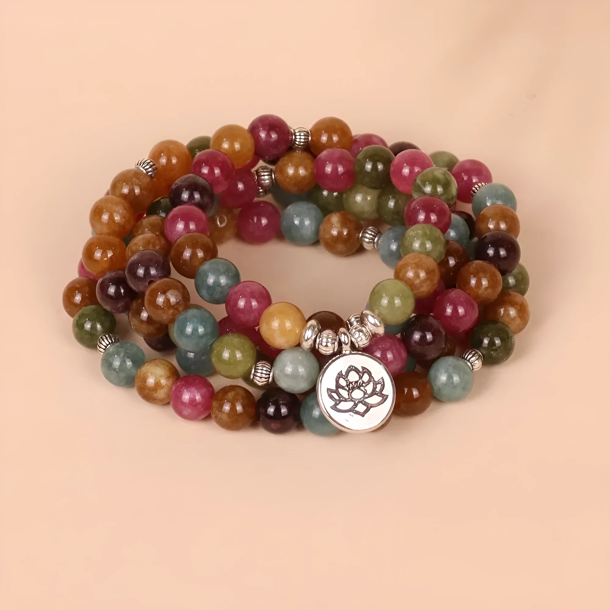 108-bead multi-layer alloy bracelet in tourmaline colour on a string.