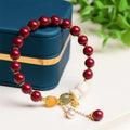 Natural cinnabar bracelet with rabbit design in traditional Chinese style