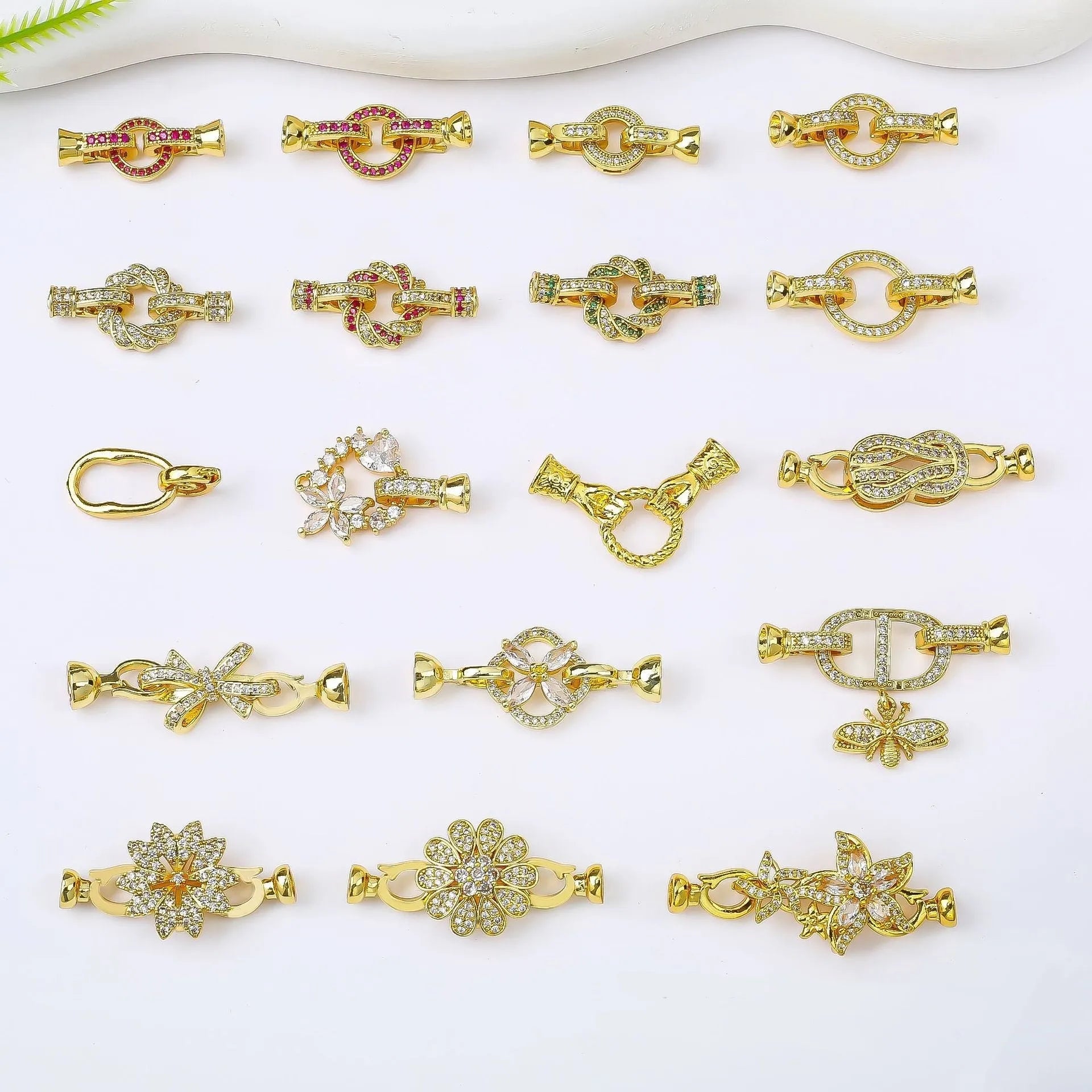 Small gold-plated brass jewellery clasp with white pearl detail for DIY necklace projects