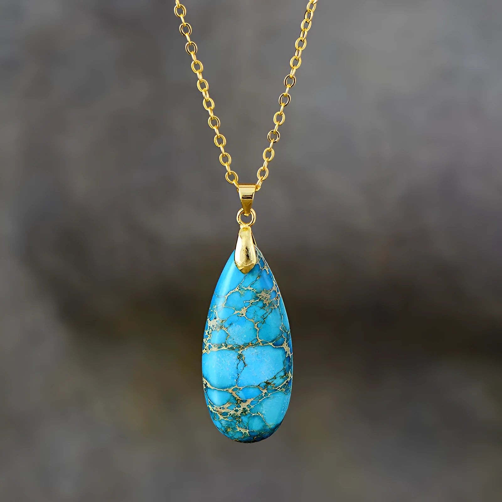 Emperor Stone jade water drop pendant necklace on an 18K gold plated chain, showing heart-shaped and constellation design options.