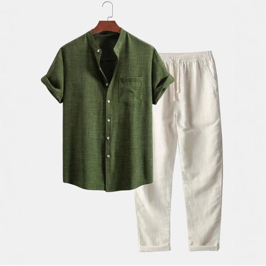 Men's blue slim-fit stand collar short-sleeved shirt with 3D digital printing, paired with trousers and shoes from the coordinated set.