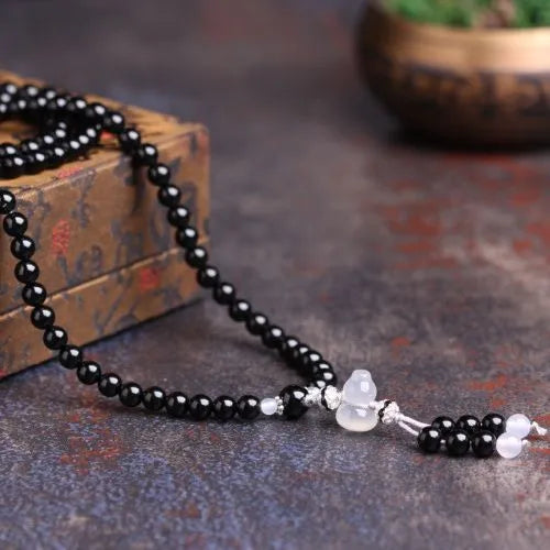 108-bead black and red agate geometric bracelet for men and women.